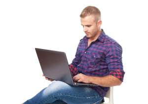 bigstock-Young-Man-Sitting-In-Chair-And-52286182