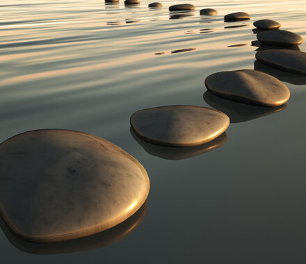 An image of some step stones to the sunset
